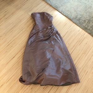 Formal gown with underskirt and asymmetrical drape